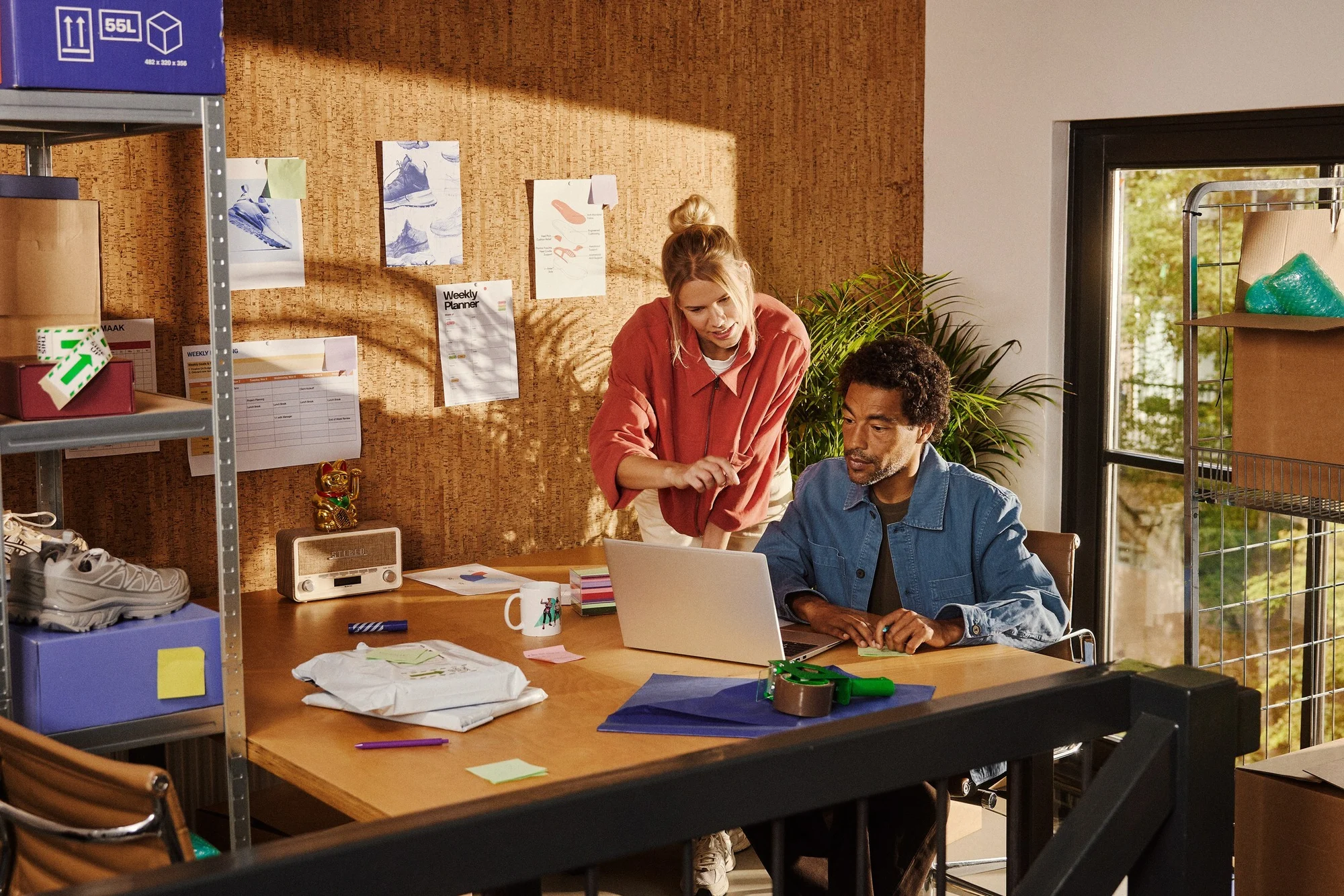 Ecommerce professionals collaborating on content at a desk
